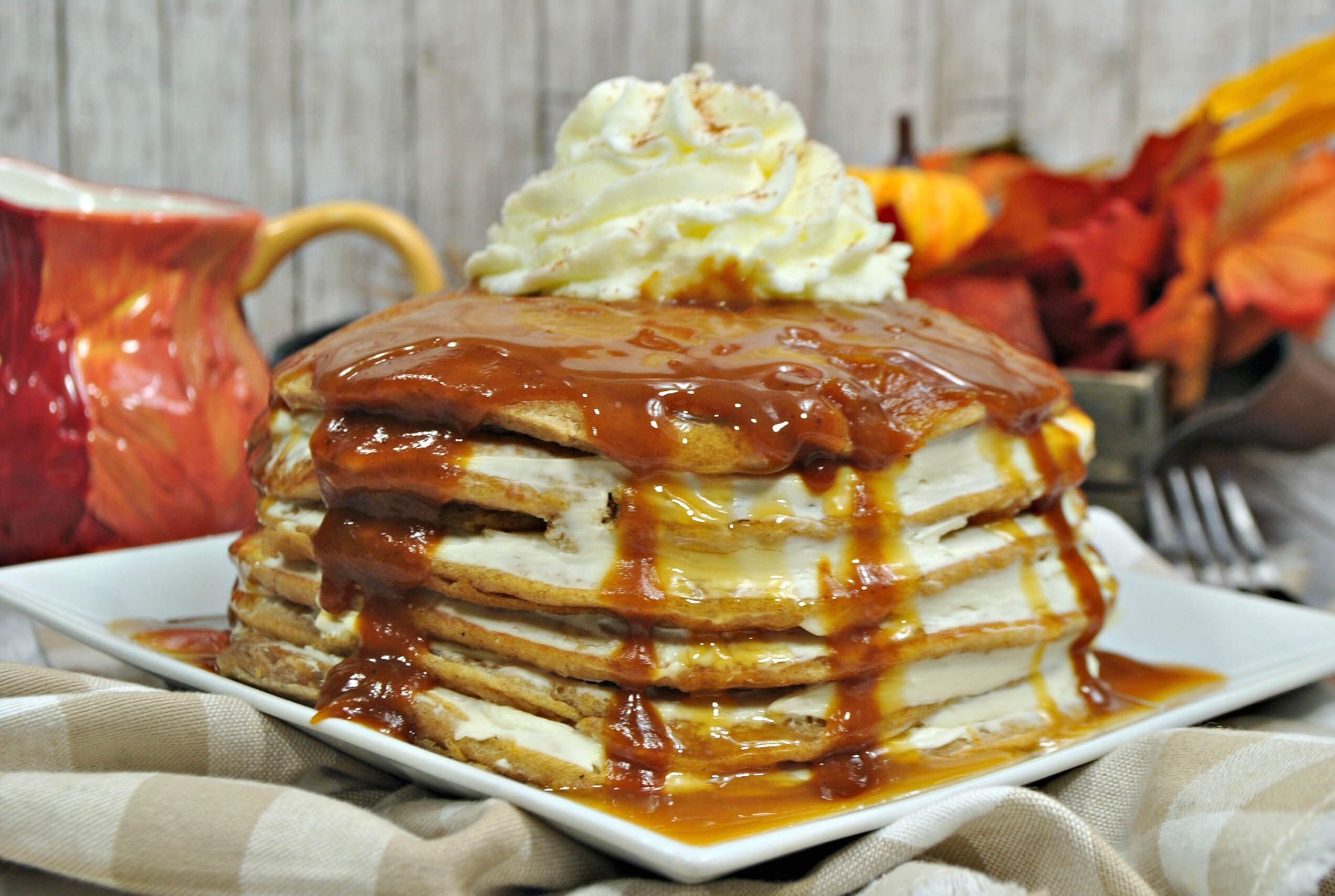 Pumpkin cheesecake pancakes w/ a butterscotch maple sauce