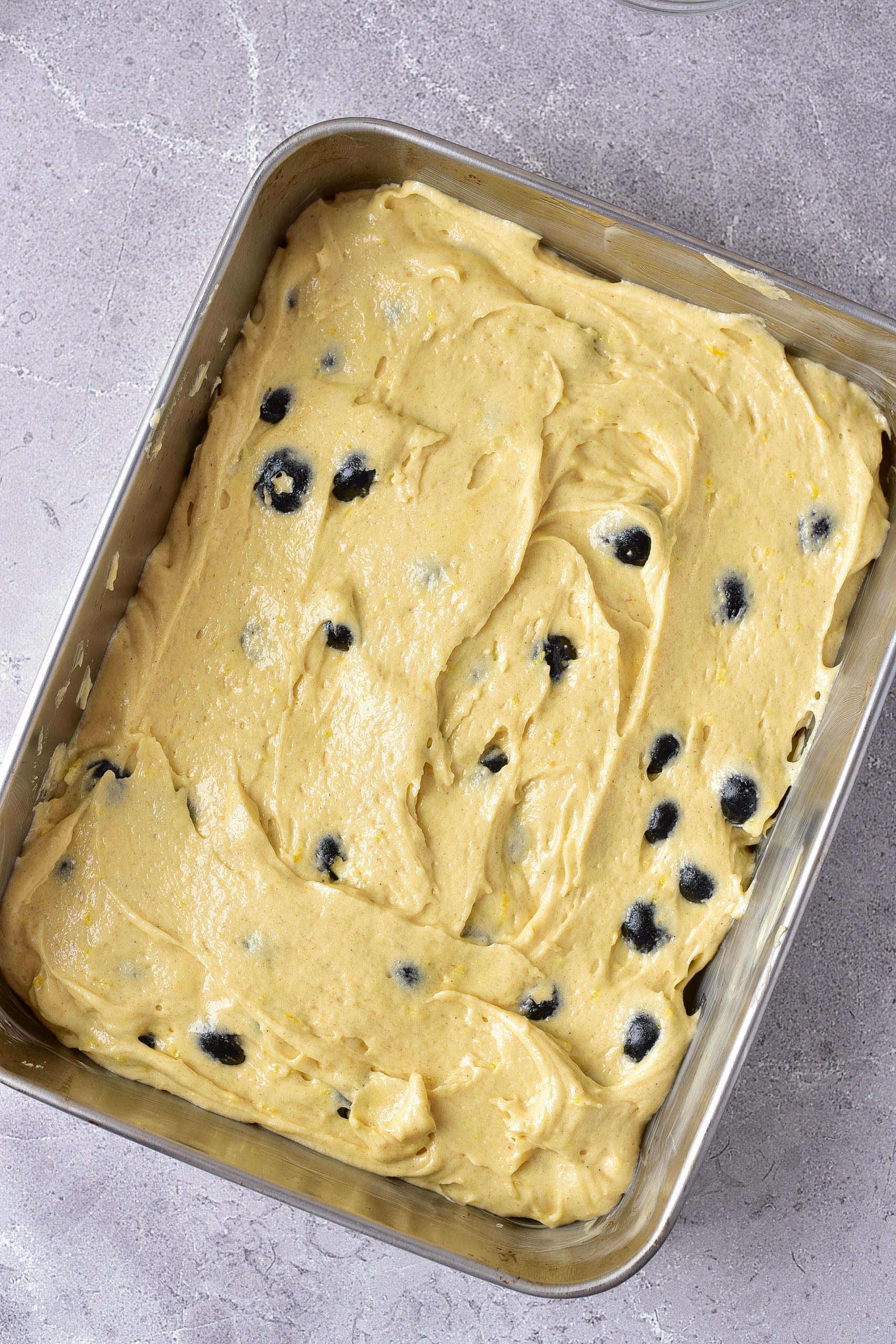 Spread the batter into the baking dish. 