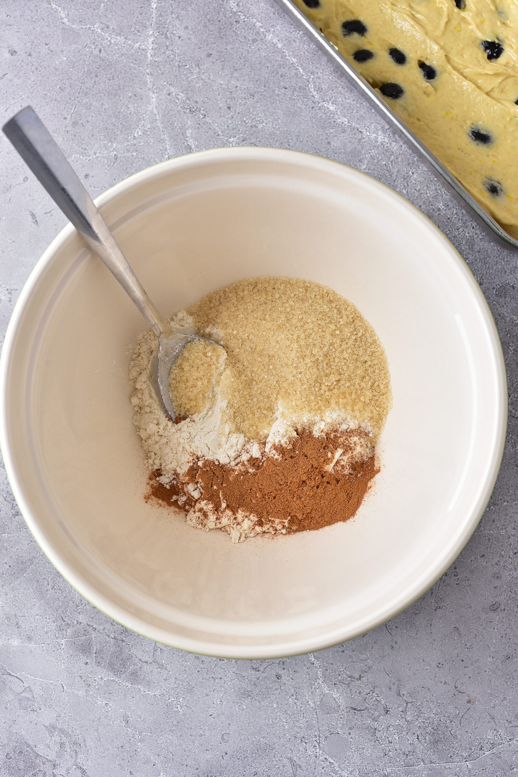 In a separate bowl, mix the ingredients for the streusel until they form a crumbly mixture. 