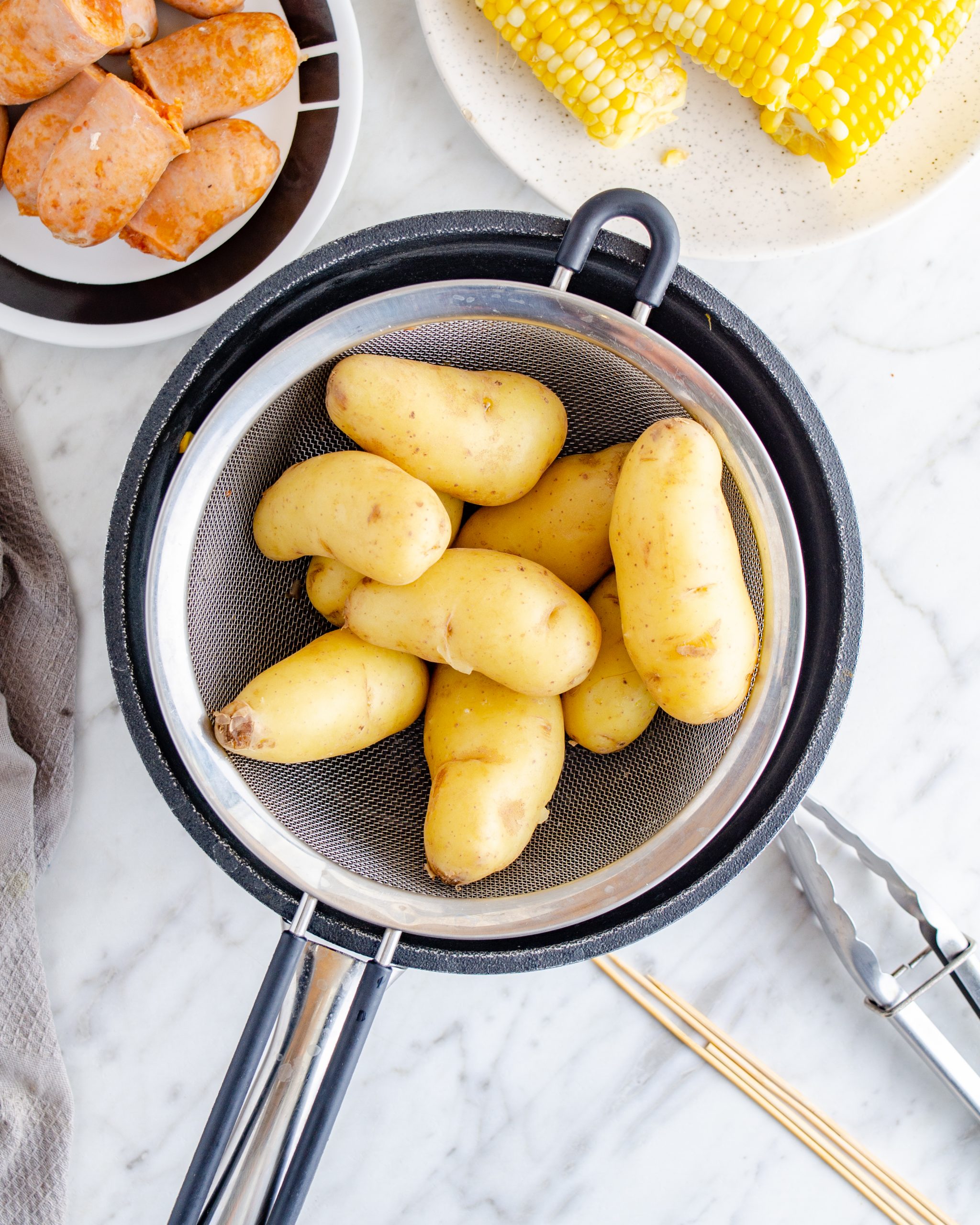 Boil the potatoes in salted water until tender. 