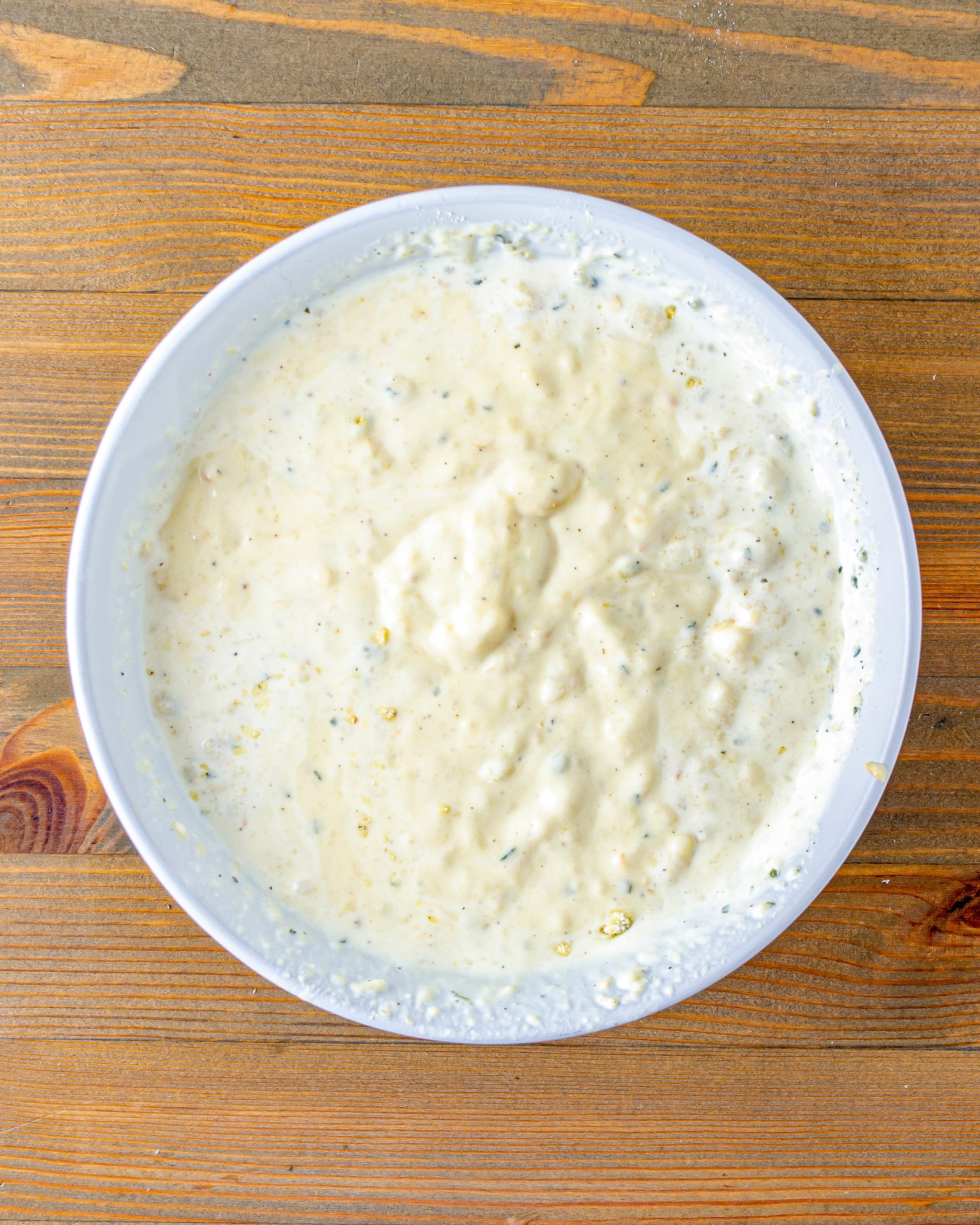 Stir together the soup, ranch seasoning, and milk in a bowl. 