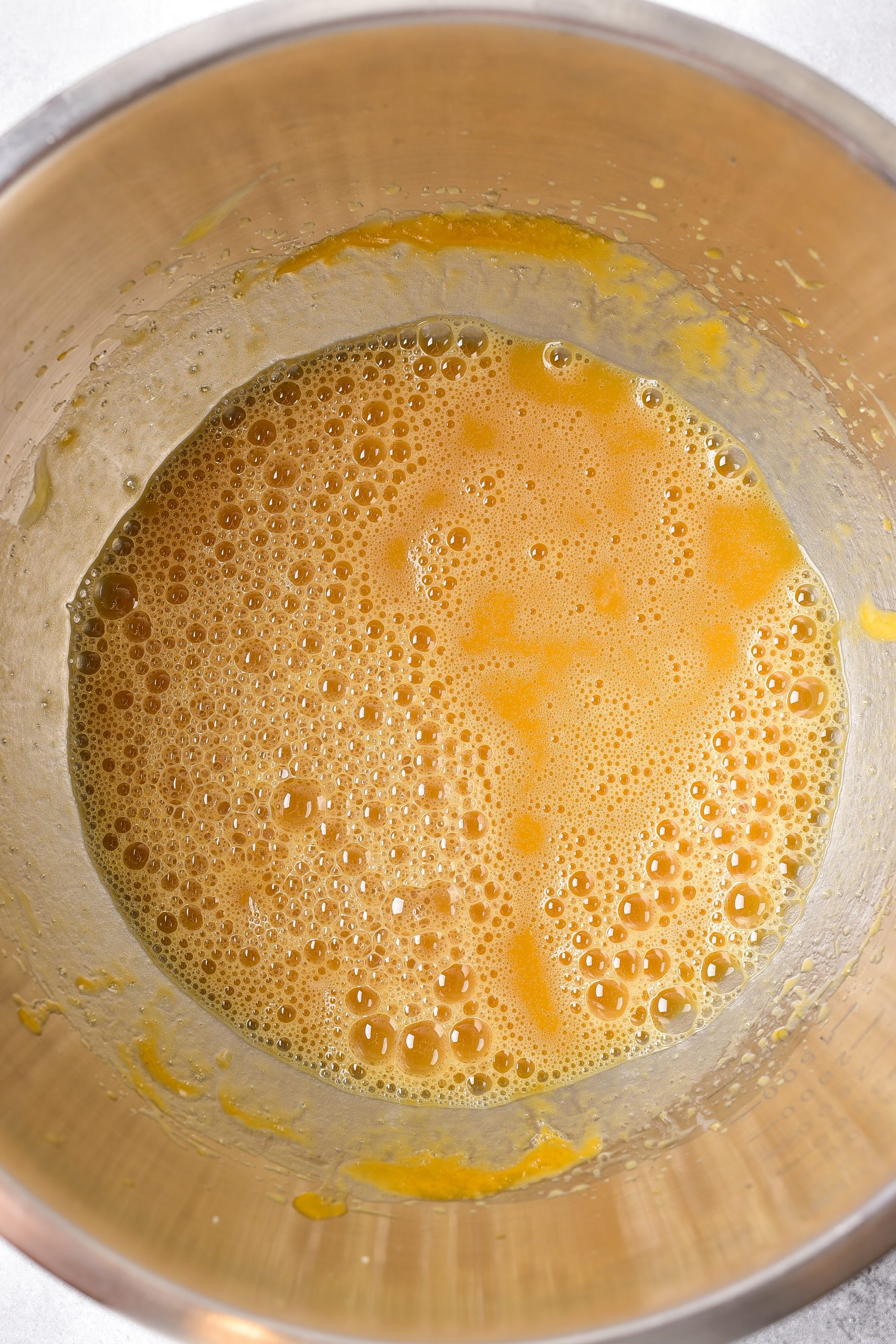 Add in the eggs, oil, and vanilla extract until well blended. 
