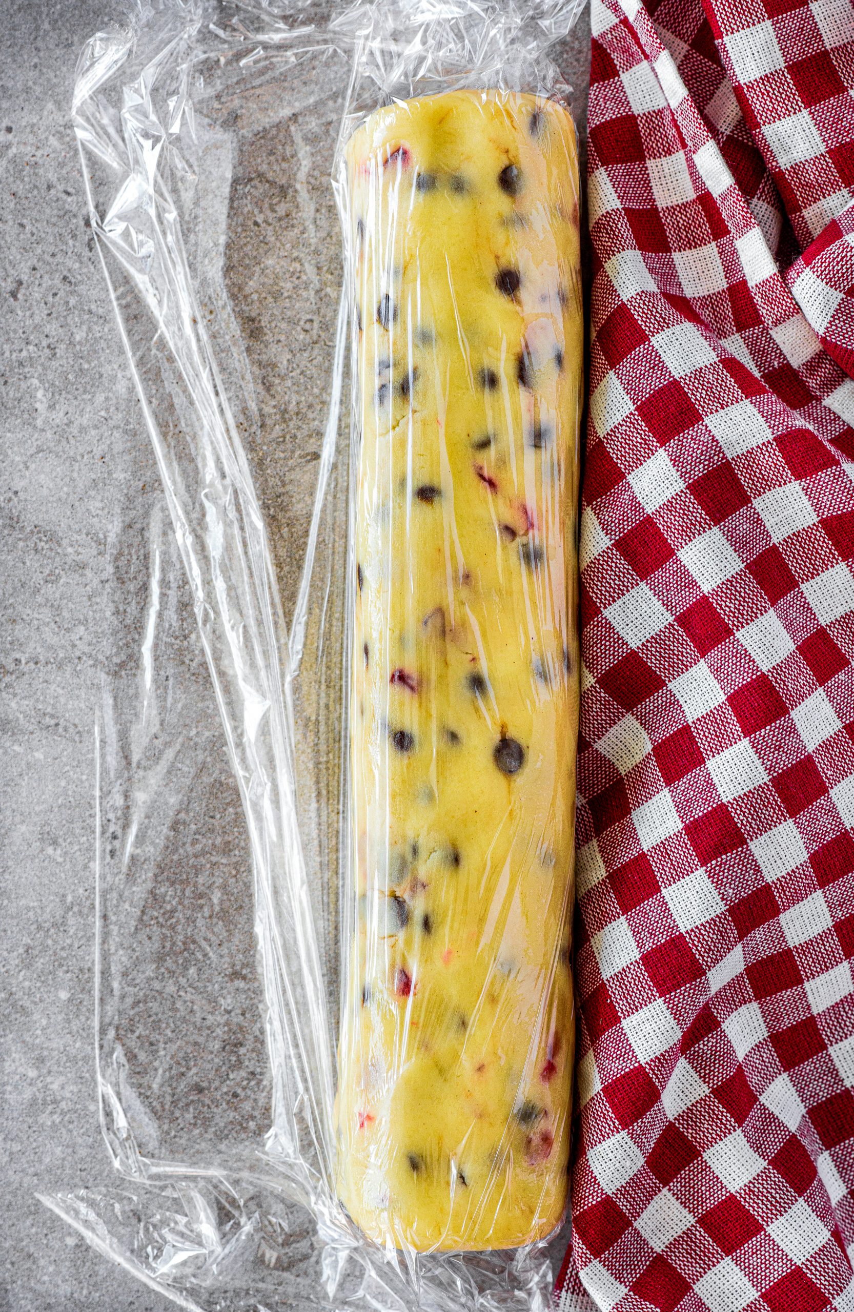 Form the dough into a log shape about 2 inches thick, and wrap in plastic wrap. 