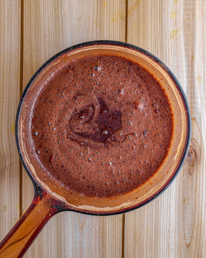 Heat the cocoa powder, sugar, and salt over medium-low heat until the sugar has melted. 