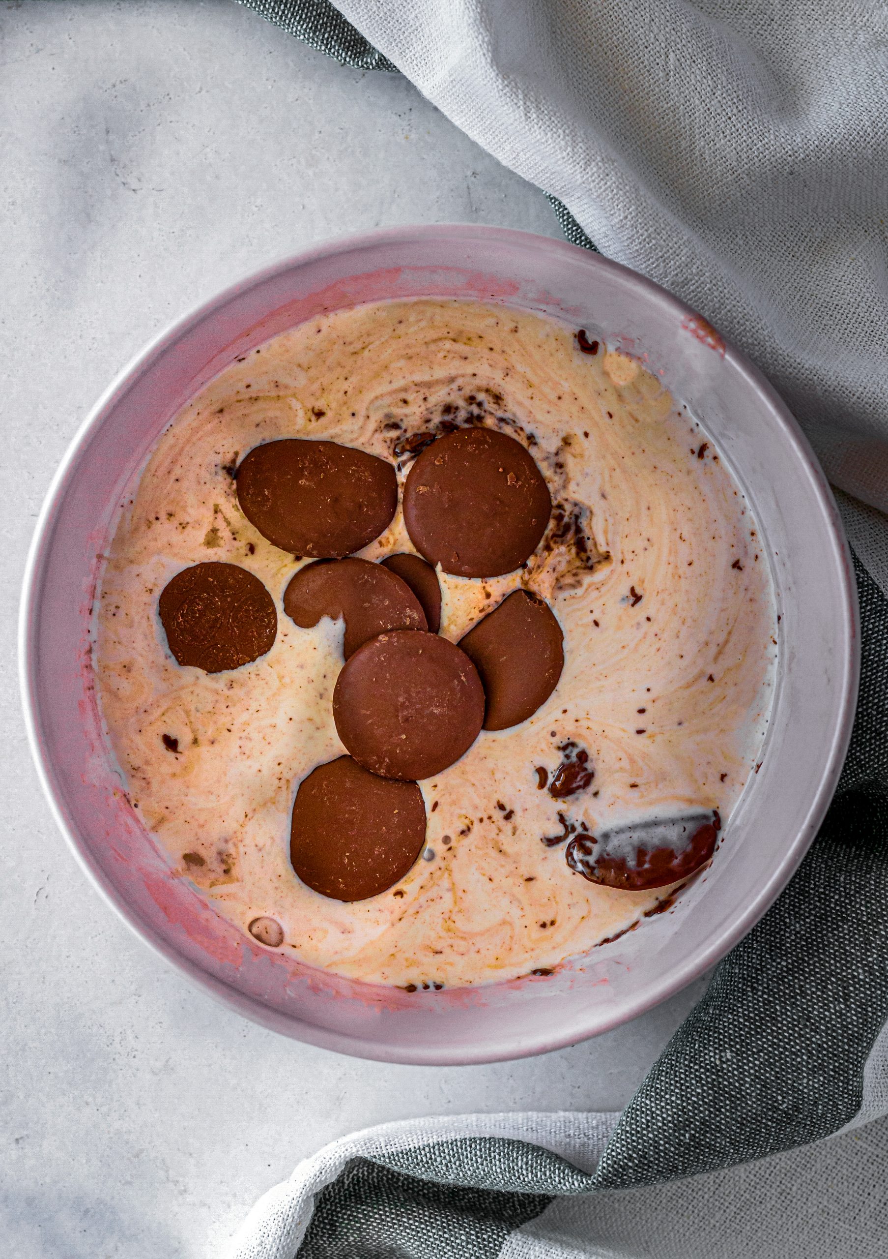 Add the ¼ cup of heavy whipping cream and chocolate chips to a bowl that is microwave safe