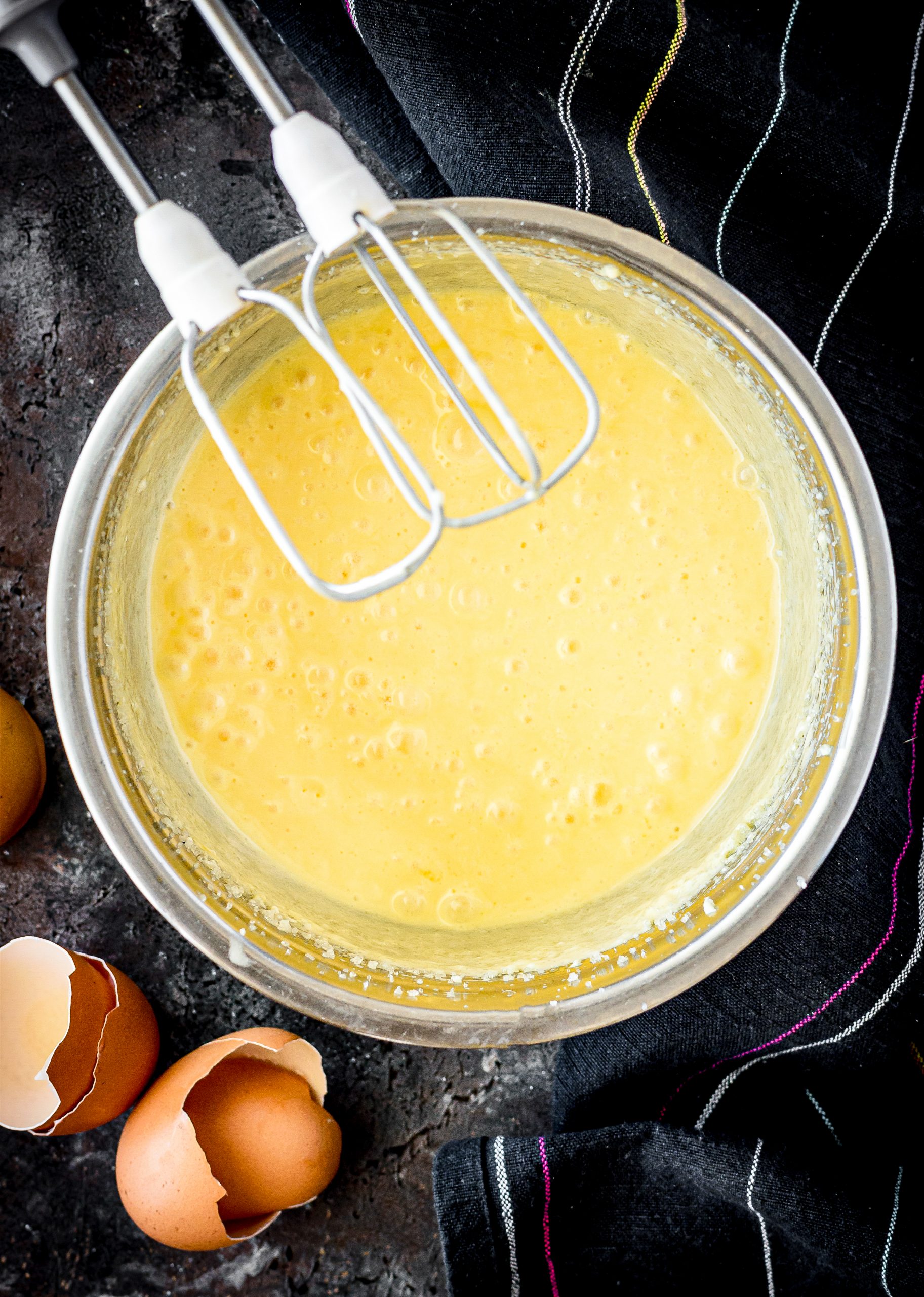 Blend in the eggs and vanilla. 