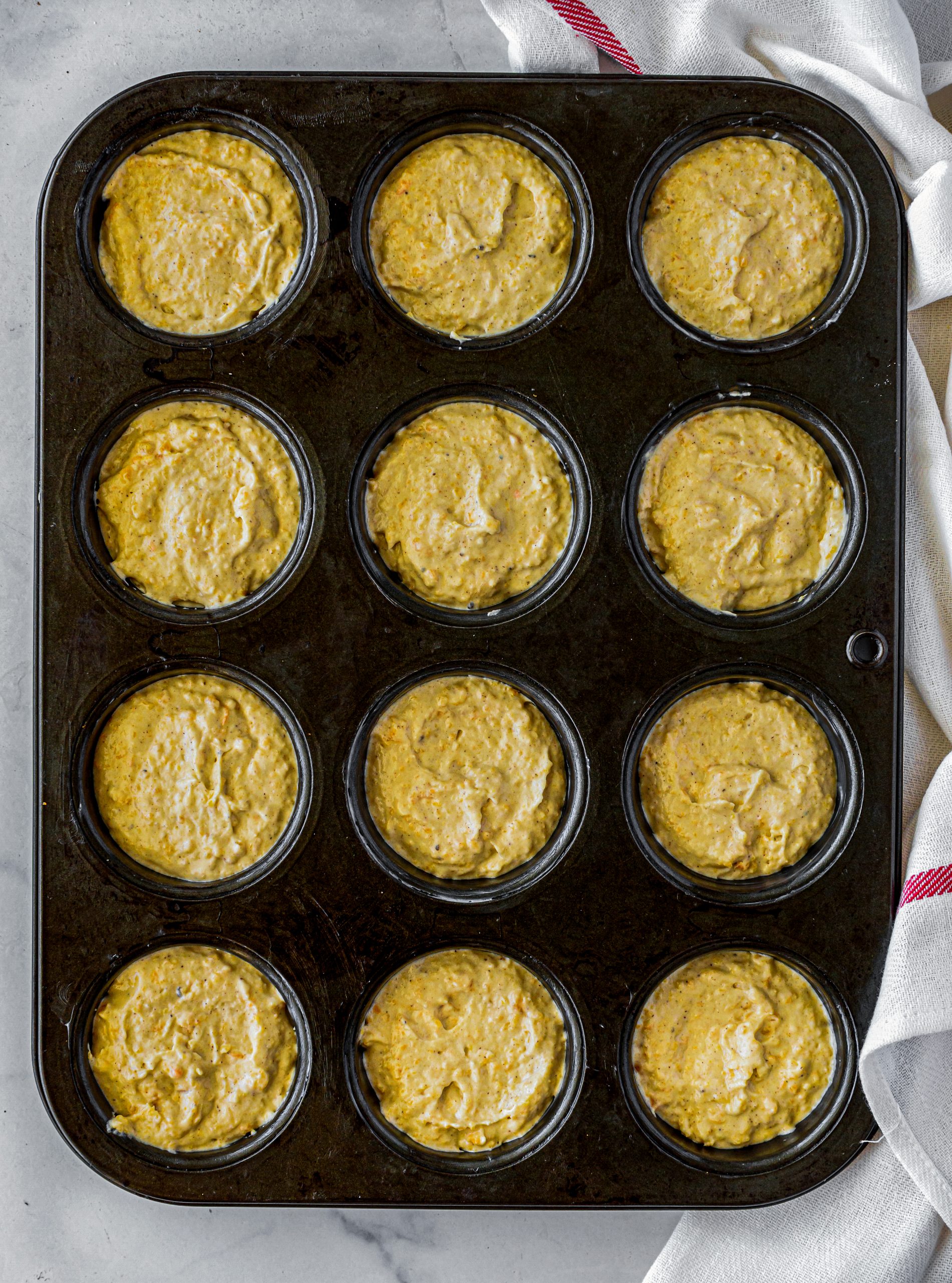 Place the batter by the tablespoon into the sections of a well-greased mini muffin tin. 