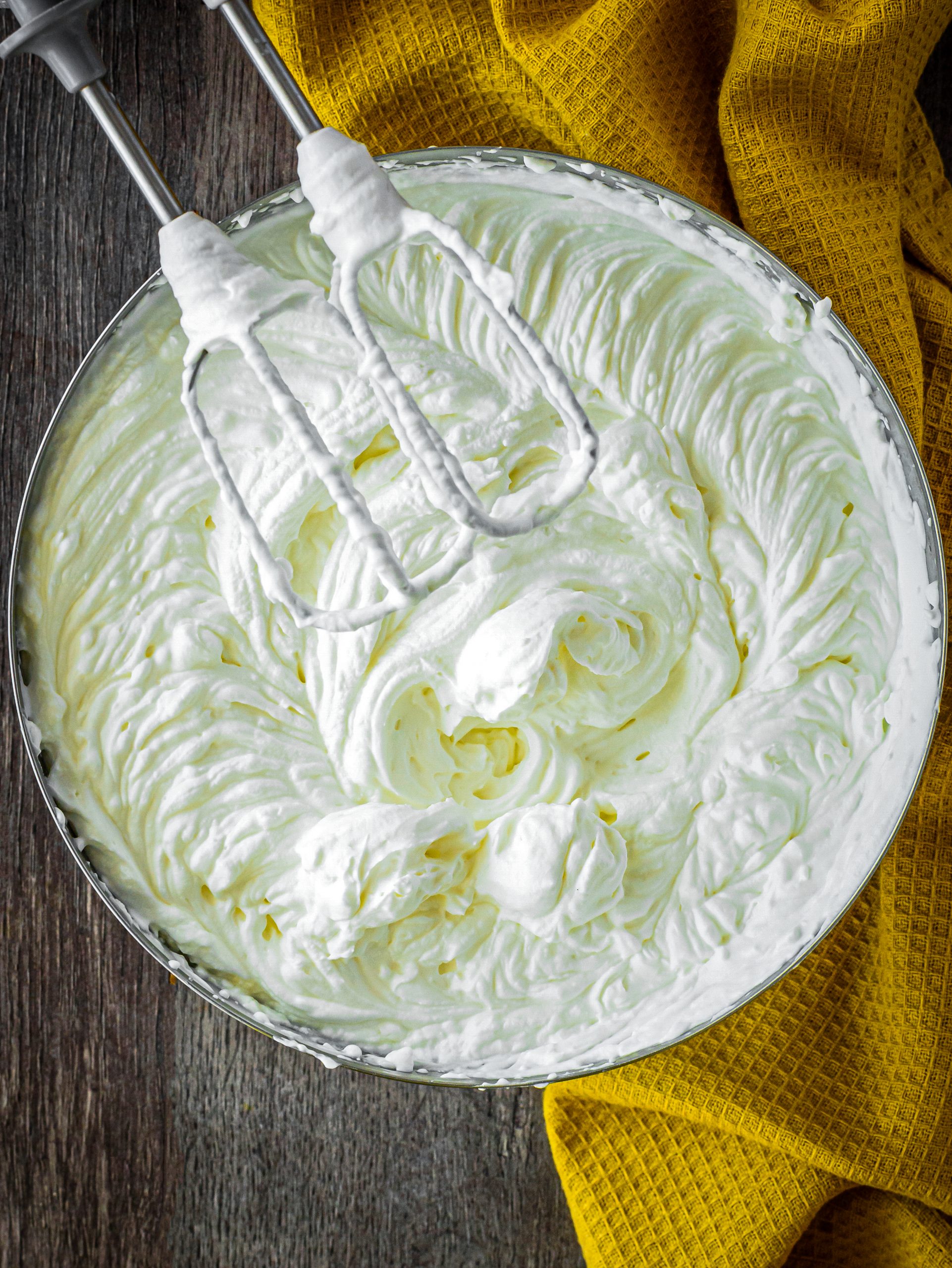 Fold the whipped cream into the cream cheese mixture. 
